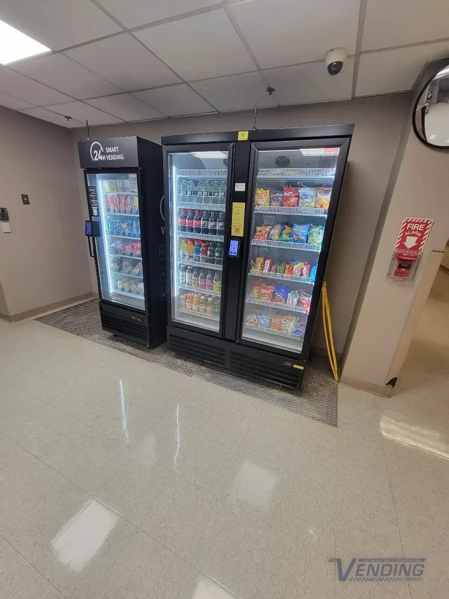 Cold beverage and snack machines installed side by side